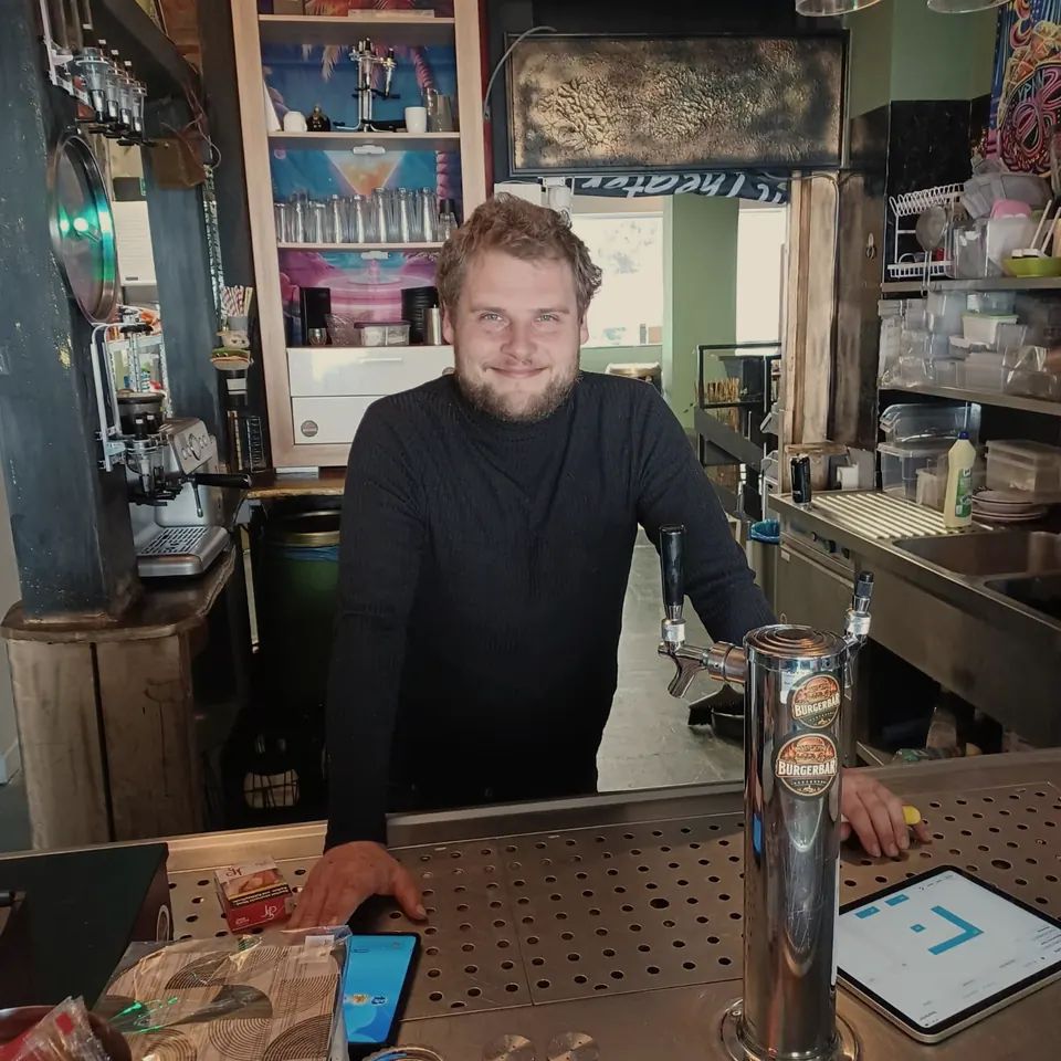 The bar in the evening: the counter in blue light